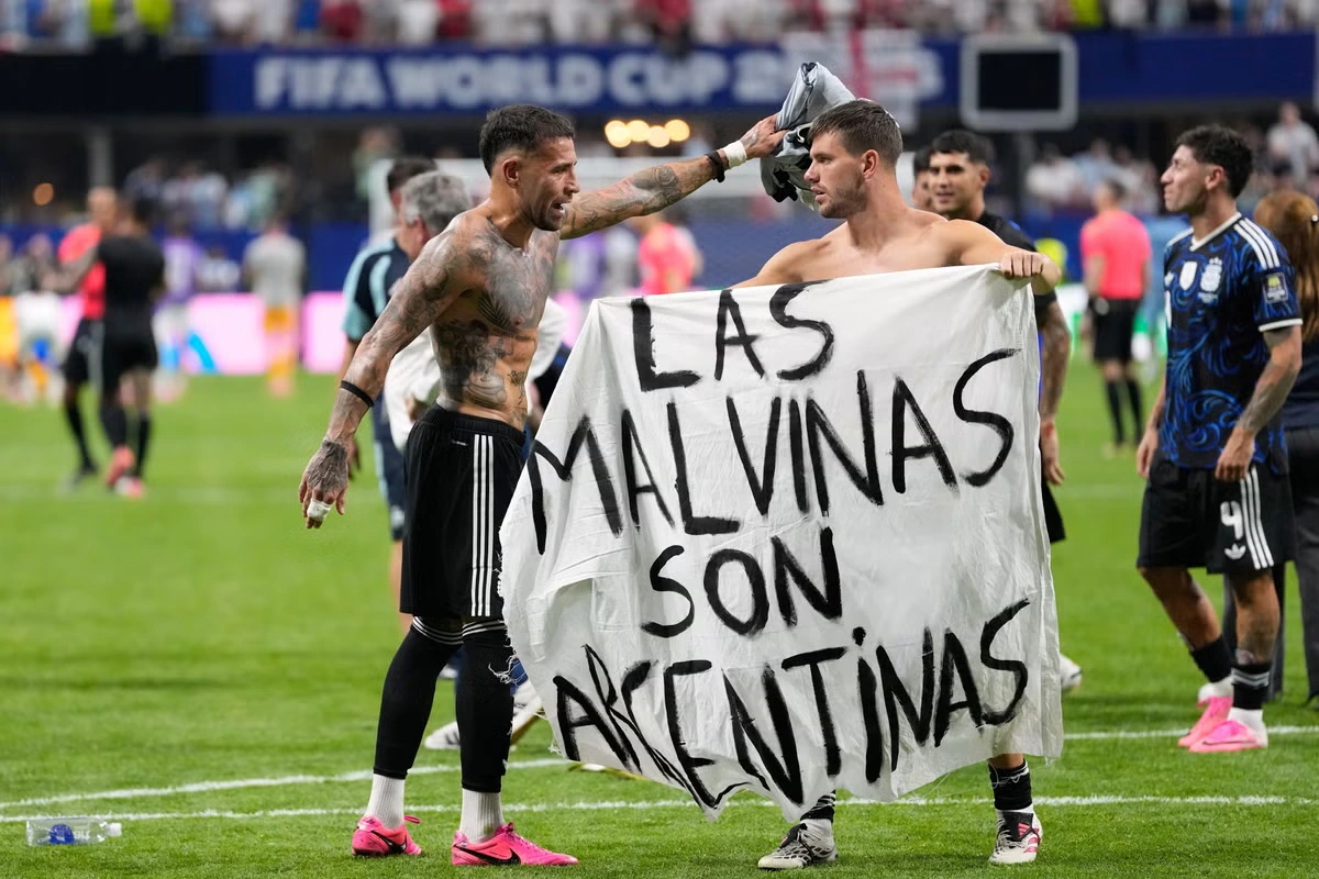 Minister hits out after Argentina players celebrate England win with ‘entirely inappropriate’ Falklands banner
