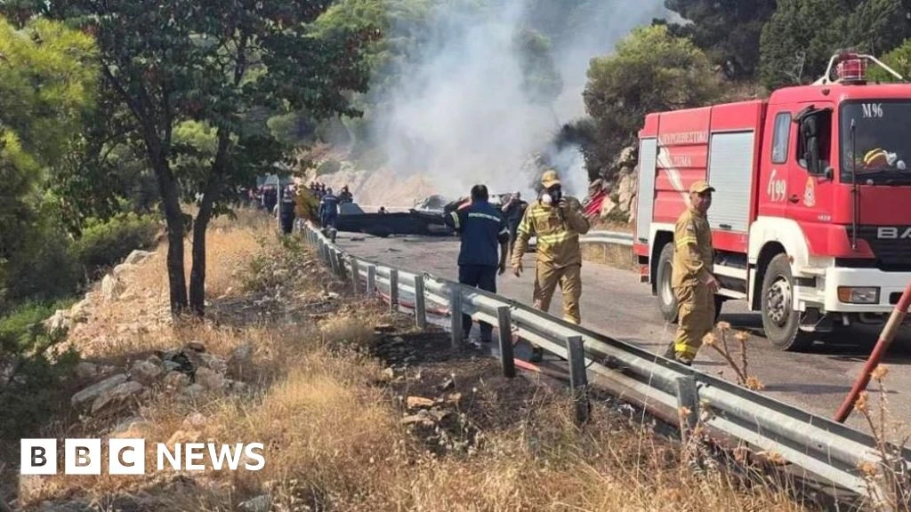 Two crew killed after firefighting helicopters collide in Greece, as British pilot survives
